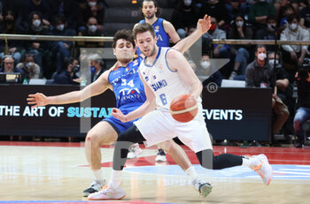 2022-02-27 - Jon Axel Gudmundsson (Iceland) (R) thwarted by  Alessandro Pajola (Italy) during the FIBA World Cup 2023 qualifiers game Italy Vs. Iceland at the Paladozza sports palace in Bologna, February 27, 2022 - Photo: Michele Nucci - FIBA WORLD CUP QUALIFIERS - ITALIA VS ISLANDA - INTERNATIONALS - BASKETBALL