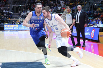 2022-02-27 - Jon Axel Gudmundsson (Iceland) (R) thwarted by  Amedeo Della Valle (Italy) during the FIBA World Cup 2023 qualifiers game Italy Vs. Iceland at the Paladozza sports palace in Bologna, February 27, 2022 - Photo: Michele Nucci - FIBA WORLD CUP QUALIFIERS - ITALIA VS ISLANDA - INTERNATIONALS - BASKETBALL