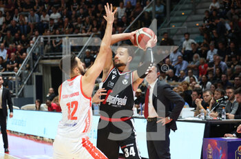2022-10-09 - Kyle Weems (Segafredo Virtus Bologna) (R)  thwarted by Luca Campogrande (Pallacanestro Trieste) during the italian basketball championship match Segafredo Virtus Bologna Vs. Pallacanestro Trieste - Bologna, October 9, 2022 at Paladozza sport palace - VIRTUS SEGAFREDO BOLOGNA VS PALLACANESTRO TRIESTE - ITALIAN SERIE A - BASKETBALL