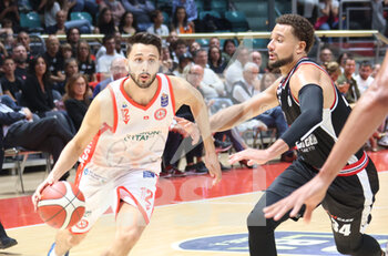 2022-10-09 - Luca Campogrande (Pallacanestro Trieste) (L) thwarted by Kyle Weems (Segafredo Virtus Bologna) during the italian basketball championship match Segafredo Virtus Bologna Vs. Pallacanestro Trieste - Bologna, October 9, 2022 at Paladozza sport palace - VIRTUS SEGAFREDO BOLOGNA VS PALLACANESTRO TRIESTE - ITALIAN SERIE A - BASKETBALL