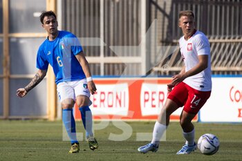 2022-06-07 - Simone Panada of Italy U20 and Fryderyk Gerbowski of Poland U20 in action during the International Friendly match between Italy U20 and Poland U20 at Stadio Riviera delle Palme on June 7, 2022 in San Benedetto del Tronto, Italy. ©Photo: Cinzia Camela. - U20 ITALY VS POLAND - OTHER - SOCCER