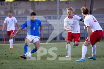 2022-06-07 - Tommaso Milanese of Italy U20 in action between Filip Szymczak, Jan Bieganski and Patryk Peda of Poland U20 during the International Friendly match between Italy U20 and Poland U20 at Stadio Riviera delle Palme on June 7, 2022 in San Benedetto del Tronto, Italy. ©Photo: Cinzia Camela. - U20 ITALY VS POLAND - OTHER - SOCCER