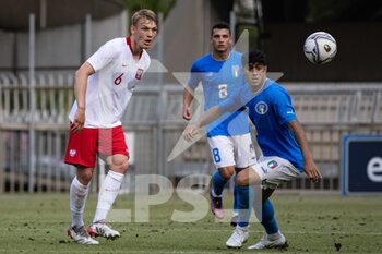 2022-06-07 - Jan Bieganski of Poland U20 and Jacopo Desogus of Italy U20 in action during the International Friendly match between Italy U20 and Poland U20 at Stadio Riviera delle Palme on June 7, 2022 in San Benedetto del Tronto, Italy. ©Photo: Cinzia Camela. - U20 ITALY VS POLAND - OTHER - SOCCER