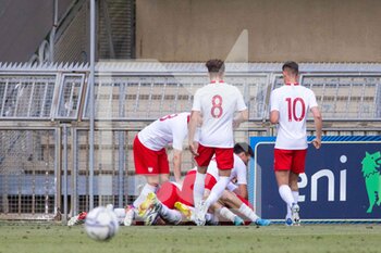 2022-06-07 - Maksymilan Tkocz of Poland U20 celebrates with his teammates after scoring the victory goal during the International Friendly match between Italy U20 and Poland U20 at Stadio Riviera delle Palme on June 7, 2022 in San Benedetto del Tronto, Italy. ©Photo: Cinzia Camela. - U20 ITALY VS POLAND - OTHER - SOCCER