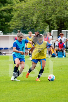 2022-06-29 - Charlotte Bilbault of France and Selma Bacha of France fight for the ball during the training of the French women's team on June 29, 2022 in Clairefontaine, France - FOOTBALL - TRAINING OF THE FRENCH WOMEN'S TEAM - OTHER - SOCCER