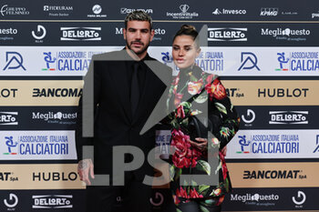 2022-10-17 - Theo Hernandez (Milan) and Zoe Cristofoli during the Gran Gala del Calcio AIC 2022 at Rho Fiera Milano, Milan, Italy on October 17, 2022 - GRAN GALA DEL CALCIO AIC PRESENTED BY HUBLOT E BANCOMAT - OTHER - SOCCER