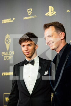 2022-10-17 - Pierre Gasly and Laurent Rossi during the red carpet ceremony of the Ballon d'Or (Golden Ball) France Football 2022 on October 17, 2022 at Theatre du Chatelet in Paris, France - FOOTBALL - BALLON D'OR 2022 - RED CARPET CEREMONY - OTHER - SOCCER