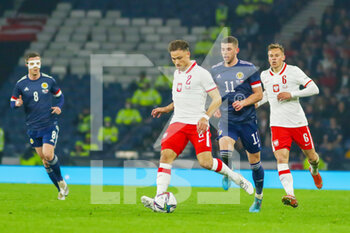 2022-03-24 - Matty Cash of Poland during the International Friendly football match between Scotland and Poland on March 24, 2022 at Hampden Park in Glasgow, Scotland - SCOTLAND VS POLAND - FRIENDLY MATCH - SOCCER