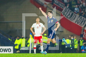 2022-03-24 - Kieran Tierney (6) of Scotland celebrates his goal 1-0 during the International Friendly football match between Scotland and Poland on March 24, 2022 at Hampden Park in Glasgow, Scotland - SCOTLAND VS POLAND - FRIENDLY MATCH - SOCCER