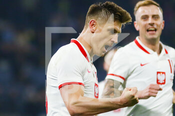2022-03-24 - Krzysztof Piatek of Poland celebrates his goal 1-1 during the International Friendly football match between Scotland and Poland on March 24, 2022 at Hampden Park in Glasgow, Scotland - SCOTLAND VS POLAND - FRIENDLY MATCH - SOCCER