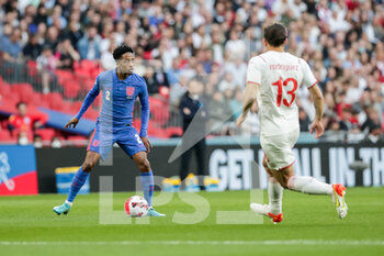 2022-03-26 - LONDON, ENGLAND - MARCH 26: during the international friendly match between England and Switzerland at Wembley Stadium on March 26, 2022 in London, United Kingdom. Kyle Walker-Peters of England against Ricardo Rodriguez of Switzerland - ENGLAND VS SWITZERLAND - FRIENDLY MATCH - SOCCER