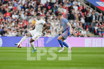 2022-03-26 - LONDON, ENGLAND - MARCH 26: during the international friendly match between England and Switzerland at Wembley Stadium on March 26, 2022 in London, United Kingdom. Breel Embolo of Switzerland against Conor Coady of England - ENGLAND VS SWITZERLAND - FRIENDLY MATCH - SOCCER