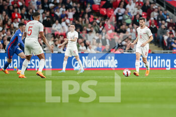 2022-03-26 - LONDON, ENGLAND - MARCH 26: during the international friendly match between England and Switzerland at Wembley Stadium on March 26, 2022 in London, United Kingdom. Remo Freuler of Switzerland in action

Letto to right: Phil Foden of England, Manuel Akanji of Switzerland, Ruben Vargas of Switzerland - ENGLAND VS SWITZERLAND - FRIENDLY MATCH - SOCCER