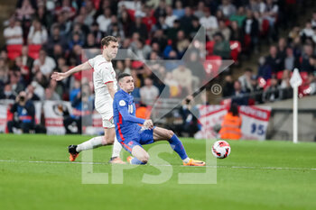 2022-03-26 - LONDON, ENGLAND - MARCH 26: during the international friendly match between England and Switzerland at Wembley Stadium on March 26, 2022 in London, United Kingdom. Fabian Frei of Switzerland against Phil Foden of England - ENGLAND VS SWITZERLAND - FRIENDLY MATCH - SOCCER