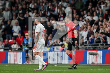 2022-03-26 - LONDON, ENGLAND - MARCH 26: during the international friendly match between England and Switzerland at Wembley Stadium on March 26, 2022 in London, United Kingdom. referee Andreas Ekberg call the penalty after VAR. - ENGLAND VS SWITZERLAND - FRIENDLY MATCH - SOCCER