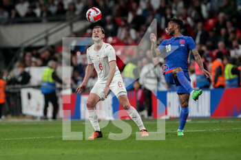 2022-03-26 - LONDON, ENGLAND - MARCH 26: during the international friendly match between England and Switzerland at Wembley Stadium on March 26, 2022 in London, United Kingdom. Fabian Frei of Switzerland against Raheem Sterling of England - ENGLAND VS SWITZERLAND - FRIENDLY MATCH - SOCCER