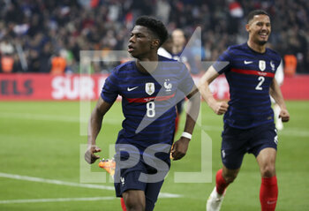 2022-03-25 - Aurelien Tchouameni of France celebrates his goal with William Saliba during the International Friendly football match between France and Ivory Coast on March 25, 2022 at Stade Velodrome in Marseille, France - FRANCE VS IVORY COAST - FRIENDLY MATCH - SOCCER