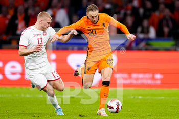 2022-03-26 - Rasmus Kristensen of Denmark and Teun Koopmeiners of the Netherlands during the International Friendly football match between Netherlands and Denmark on March 26, 2022 at the Johan Cruijff ArenA in Amsterdam, Netherlands - NETHERLANDS VS DENMARK - FRIENDLY MATCH - SOCCER