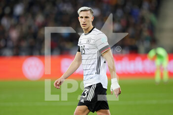 2022-03-26 - Nico Schlotterbeck of Germany during the International Friendly football match between Germany and Israel on March 26, 2022 at PreZero Arena in Sinsheim, Germany - GERMANY VS ISRAEL - FRIENDLY MATCH - SOCCER