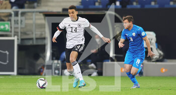 2022-03-26 - Jamal Musiala of Germany and Gavriel Kanichowsky of Israel during the International Friendly football match between Germany and Israel on March 26, 2022 at PreZero Arena in Sinsheim, Germany - GERMANY VS ISRAEL - FRIENDLY MATCH - SOCCER