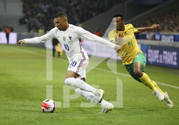 2022-03-29 - Kylian Mbappe of France, Mothobi Mvala of South Africa during the International Friendly football match between France and South Africa on March 29, 2022 at Stade Pierre Mauroy in Villeneuve-d'Ascq near Lille, France - FRANCE VS SOUTH AFRICA - FRIENDLY MATCH - SOCCER