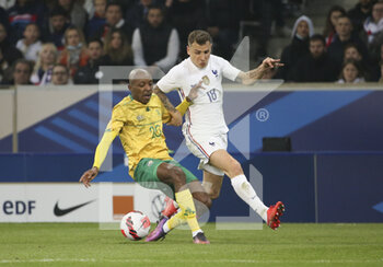 2022-03-29 - Lucas Digne of France, Khuliso Mudau of South Africa (left) during the International Friendly football match between France and South Africa on March 29, 2022 at Stade Pierre Mauroy in Villeneuve-d'Ascq near Lille, France - FRANCE VS SOUTH AFRICA - FRIENDLY MATCH - SOCCER