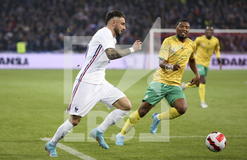 2022-03-29 - Jonathan Clauss of France, Lyle Lakay of South Africa during the International Friendly football match between France and South Africa on March 29, 2022 at Stade Pierre Mauroy in Villeneuve-d'Ascq near Lille, France - FRANCE VS SOUTH AFRICA - FRIENDLY MATCH - SOCCER