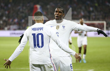 2022-03-29 - Kylian Mbappe of France celebrates his second goal with Paul Pogba during the International Friendly football match between France and South Africa on March 29, 2022 at Stade Pierre Mauroy in Villeneuve-d'Ascq near Lille, France - FRANCE VS SOUTH AFRICA - FRIENDLY MATCH - SOCCER