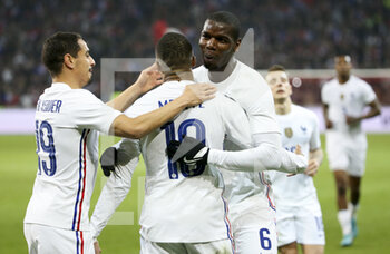 2022-03-29 - Kylian Mbappe of France celebrates his second goal with Wissam Ben Yedder, Paul Pogba during the International Friendly football match between France and South Africa on March 29, 2022 at Stade Pierre Mauroy in Villeneuve-d'Ascq near Lille, France - FRANCE VS SOUTH AFRICA - FRIENDLY MATCH - SOCCER