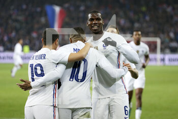 2022-03-29 - Kylian Mbappe of France celebrates his second goal with Wissam Ben Yedder, Paul Pogba during the International Friendly football match between France and South Africa on March 29, 2022 at Stade Pierre Mauroy in Villeneuve-d'Ascq near Lille, France - FRANCE VS SOUTH AFRICA - FRIENDLY MATCH - SOCCER