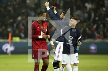 2022-03-29 - Goalkeeper of France Mike Maignan, Jonathan Clauss of France salute the supporters following the International Friendly football match between France and South Africa on March 29, 2022 at Stade Pierre Mauroy in Villeneuve-d'Ascq near Lille, France - FRANCE VS SOUTH AFRICA - FRIENDLY MATCH - SOCCER