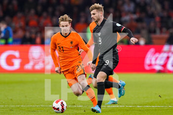 2022-03-29 - Frenkie de Jong of the Netherlands battles for the ball with Timo Werner of Germany during the International Friendly football match between Netherlands and Germany on March 29, 2022 at the Johan Cruijff ArenA in Amsterdam, Netherlands - NETHERLANDS VS GERMANY - FRIENDLY MATCH - SOCCER