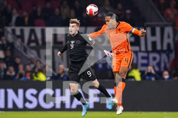 2022-03-29 - Timo Werner of Germany battles for the ball with Virgil van Dijk of the Netherlands during the International Friendly football match between Netherlands and Germany on March 29, 2022 at the Johan Cruijff ArenA in Amsterdam, Netherlands - NETHERLANDS VS GERMANY - FRIENDLY MATCH - SOCCER