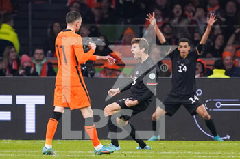 2022-03-29 - Thomas Muller of Germany celebrates after scoring his sides first goal during the International Friendly football match between Netherlands and Germany on March 29, 2022 at the Johan Cruijff ArenA in Amsterdam, Netherlands - NETHERLANDS VS GERMANY - FRIENDLY MATCH - SOCCER
