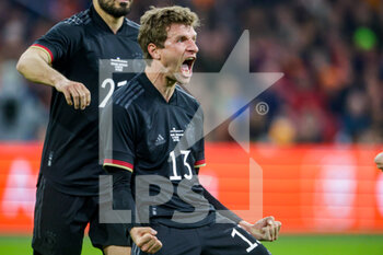 2022-03-29 - Thomas Muller of Germany is celebrating his goal during the International Friendly football match between Netherlands and Germany on March 29, 2022 at the Johan Cruijff ArenA in Amsterdam, Netherlands - NETHERLANDS VS GERMANY - FRIENDLY MATCH - SOCCER