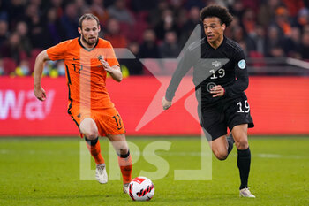 2022-03-29 - Daley Blind of the Netherlands battles for the ball with Leroy Sane of Germany during the International Friendly football match between Netherlands and Germany on March 29, 2022 at the Johan Cruijff ArenA in Amsterdam, Netherlands - NETHERLANDS VS GERMANY - FRIENDLY MATCH - SOCCER