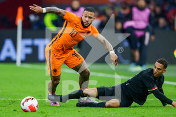 2022-03-29 - Memphis Depay of the Netherlands, Thilo Kehrer of Germany during the International Friendly football match between Netherlands and Germany on March 29, 2022 at the Johan Cruijff ArenA in Amsterdam, Netherlands - NETHERLANDS VS GERMANY - FRIENDLY MATCH - SOCCER