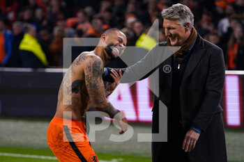 2022-03-29 - Bastian Schweinsteiger and Memphis Depay of the Netherlands during the International Friendly football match between Netherlands and Germany on March 29, 2022 at the Johan Cruijff ArenA in Amsterdam, Netherlands - NETHERLANDS VS GERMANY - FRIENDLY MATCH - SOCCER