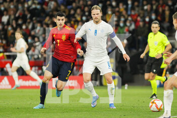 2022-03-29 - Alvaro Morata of Spain and Birkir Bjarnason of Iceland during the Friendly football match between Spain and Iceland on March 29, 2022 at Riazor stadium in La Coruna, Spain - SPAIN VS ICELAND - FRIENDLY MATCH - SOCCER