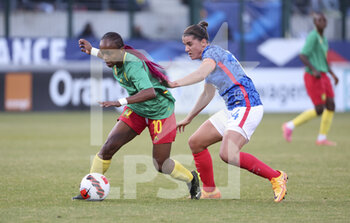 2022-06-25 - Jeannette Yango of Cameroon, Charlotte Bilbault of France during the Women's Friendly football match between France and Cameroon on June 25, 2022 at Stade Pierre Brisson in Beauvais, France - FOOTBALL - WOMEN'S FRIENDLY GAME - FRANCE V CAMEROON - FRIENDLY MATCH - SOCCER