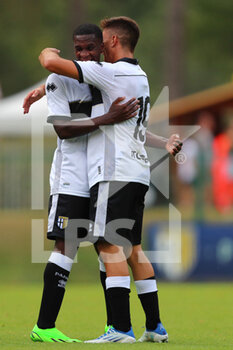 2022-07-23 - Nathan Buayi-Kiala of PARMA CALCIO celebrates after scoring a goal with Vasileios Zagaritis during the friendly match between Parma Calcio and FeralpiSalò on July 23, 2022 in Pinzolo (TN), Italy. - PARMA CALCIO VS FERALPISALò - FRIENDLY MATCH - SOCCER