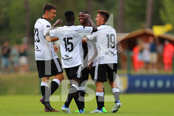 2022-07-23 - Nathan Buayi-Kiala of PARMA CALCIO celebrates after scoring a goal with his teammates during the friendly match between Parma Calcio and FeralpiSalò on July 23, 2022 in Pinzolo (TN), Italy. - PARMA CALCIO VS FERALPISALò - FRIENDLY MATCH - SOCCER