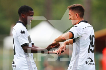 2022-07-23 - Nathan Buayi-Kiala of PARMA CALCIO celebrates after scoring a goal with Vasileios Zagaritis during the friendly match between Parma Calcio and FeralpiSalò on July 23, 2022 in Pinzolo (TN), Italy. - PARMA CALCIO VS FERALPISALò - FRIENDLY MATCH - SOCCER