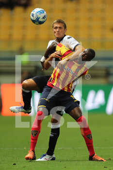 2022-07-29 - Simone Romagnoli of PARMA CALCIO competes for the ball with Assan Ceesay of US LECCE during the friendly match between Parma Calcio and US Lecce at Ennio Tardini on July 29, 2022 in Parma, Italy. - PARMA CALCIO VS US LECCE - FRIENDLY MATCH - SOCCER