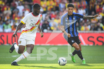 2022-07-23 - Kevin DANSO of Lens and Joaquin CORREA of Inter Milan during the Pre Season Friendly football match between RC Lens and FC Internazionale Milano (Inter Milan) on July 23, 2022 at Bollaert-Delelis stadium in Lens, France - FOOTBALL - FRIENDLY GAME - RC LENS V FC INTER - INTERNAZIONALE MILANO - FRIENDLY MATCH - SOCCER