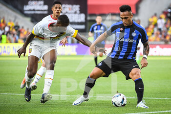 2022-07-23 - Kevin DANSO of Lens and Lautaro MARTINEZ of Inter Milan during the Pre Season Friendly football match between RC Lens and FC Internazionale Milano (Inter Milan) on July 23, 2022 at Bollaert-Delelis stadium in Lens, France - FOOTBALL - FRIENDLY GAME - RC LENS V FC INTER - INTERNAZIONALE MILANO - FRIENDLY MATCH - SOCCER