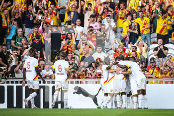 2022-07-23 - Lois OPENDA of Lens celebrate his goal with teammates during the Pre Season Friendly football match between RC Lens and FC Internazionale Milano (Inter Milan) on July 23, 2022 at Bollaert-Delelis stadium in Lens, France - FOOTBALL - FRIENDLY GAME - RC LENS V FC INTER - INTERNAZIONALE MILANO - FRIENDLY MATCH - SOCCER