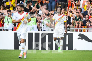 2022-07-23 - Lois OPENDA of Lens celebrate his goal with Jimmy CABOT of Lens during the Pre Season Friendly football match between RC Lens and FC Internazionale Milano (Inter Milan) on July 23, 2022 at Bollaert-Delelis stadium in Lens, France - FOOTBALL - FRIENDLY GAME - RC LENS V FC INTER - INTERNAZIONALE MILANO - FRIENDLY MATCH - SOCCER