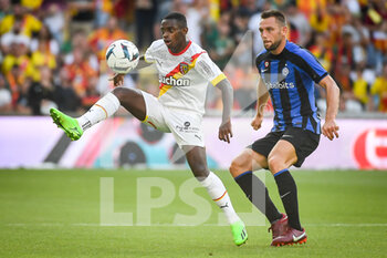 2022-07-23 - David PEREIRA DA COSTA of Lens and Stefan DE VRIJ of Inter Milan during the Pre Season Friendly football match between RC Lens and FC Internazionale Milano (Inter Milan) on July 23, 2022 at Bollaert-Delelis stadium in Lens, France - FOOTBALL - FRIENDLY GAME - LENS V FC INTER - INTERNAZIONALE - FRIENDLY MATCH - SOCCER