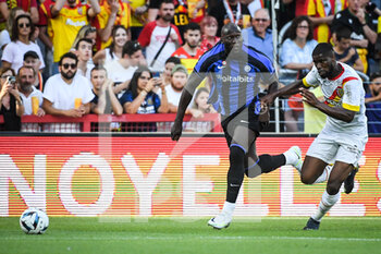 2022-07-23 - Romelu LUKAKU of Inter Milan and Kevin DANSO of Lens during the Pre Season Friendly football match between RC Lens and FC Internazionale Milano (Inter Milan) on July 23, 2022 at Bollaert-Delelis stadium in Lens, France - FOOTBALL - FRIENDLY GAME - LENS V FC INTER - INTERNAZIONALE - FRIENDLY MATCH - SOCCER